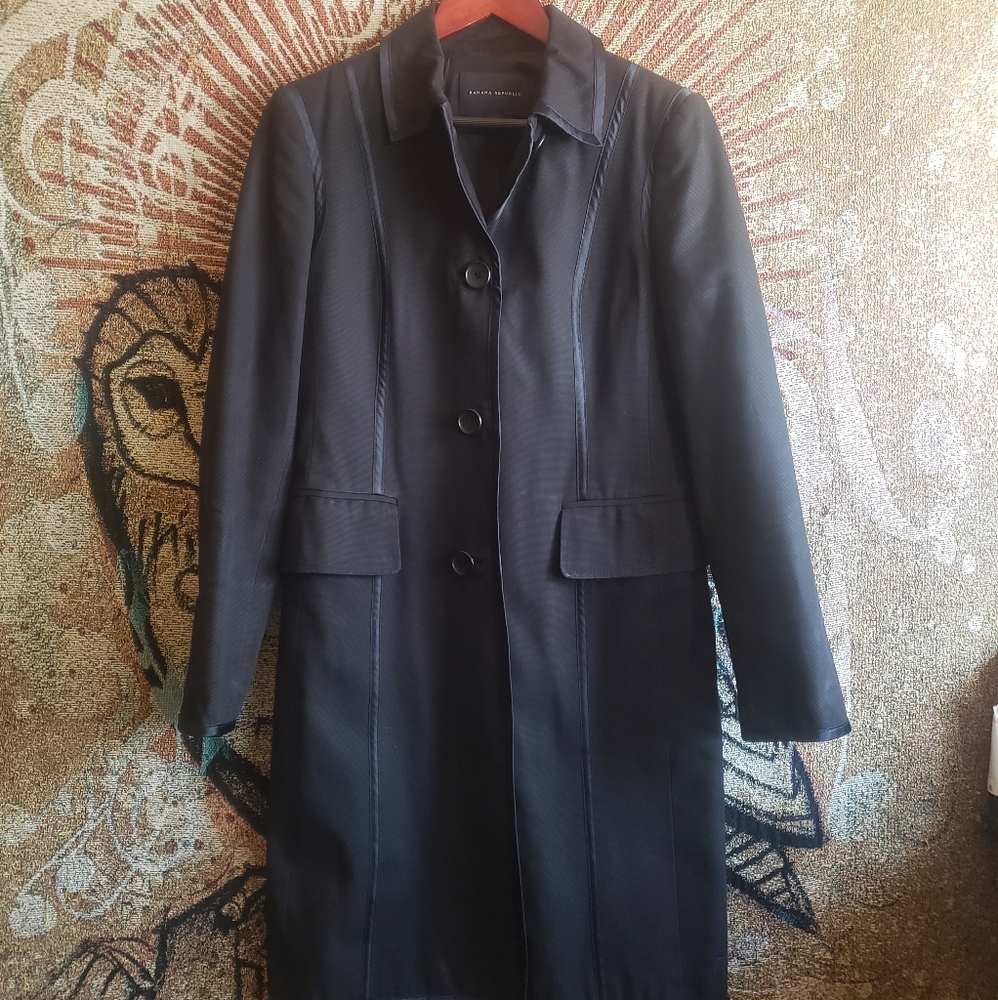 Thick woven cotton long jacket with Acetate lining and trim.